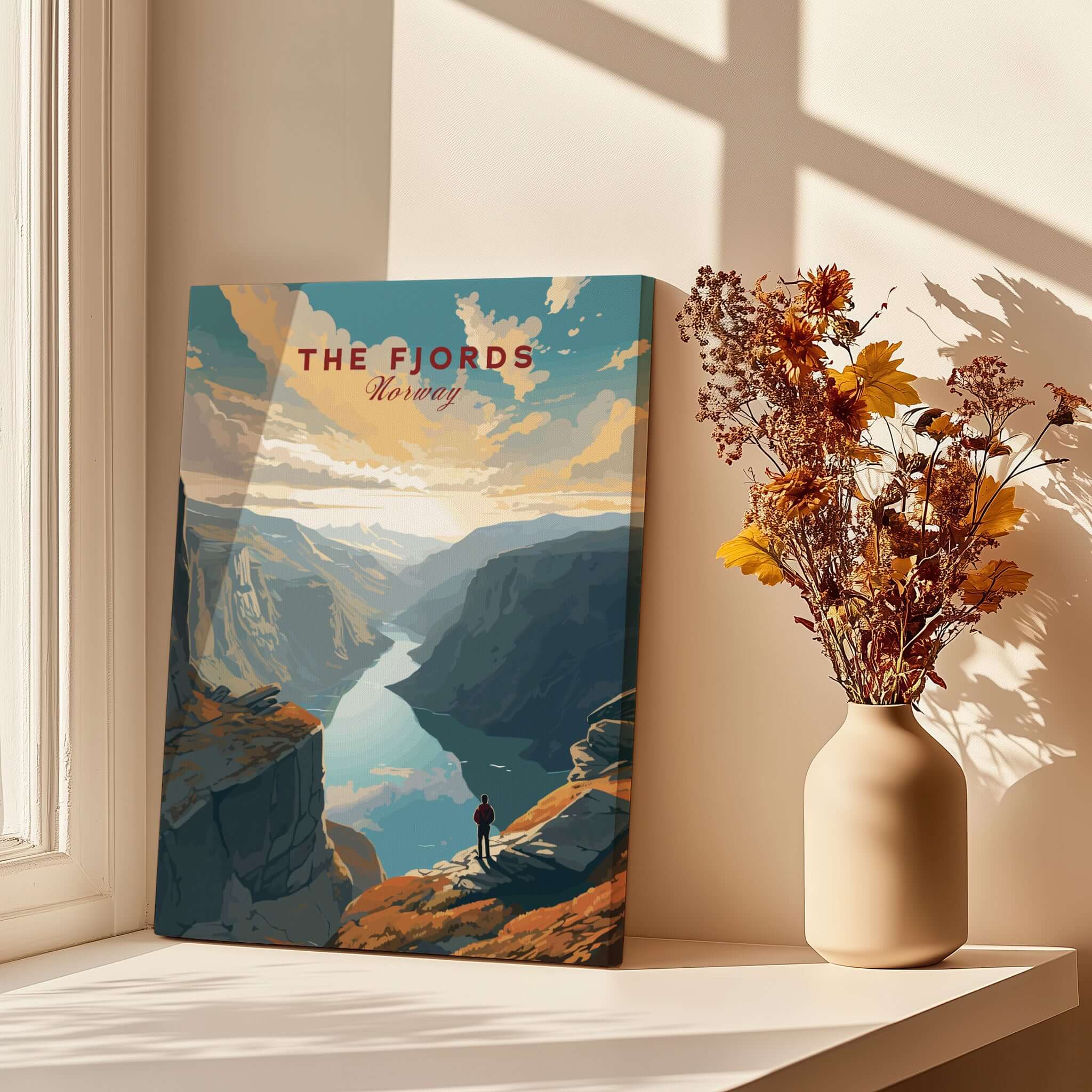 Fjord Wall Art Print - Norway displayed in a bright room with a vase of flowers, showcasing Scandinavian landscape beauty.