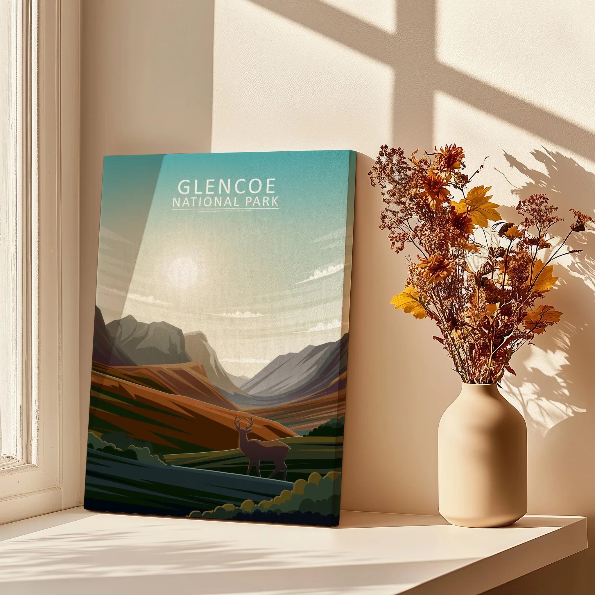 Glencoe National Park art print on windowsill with autumn flowers and sunlight shadows