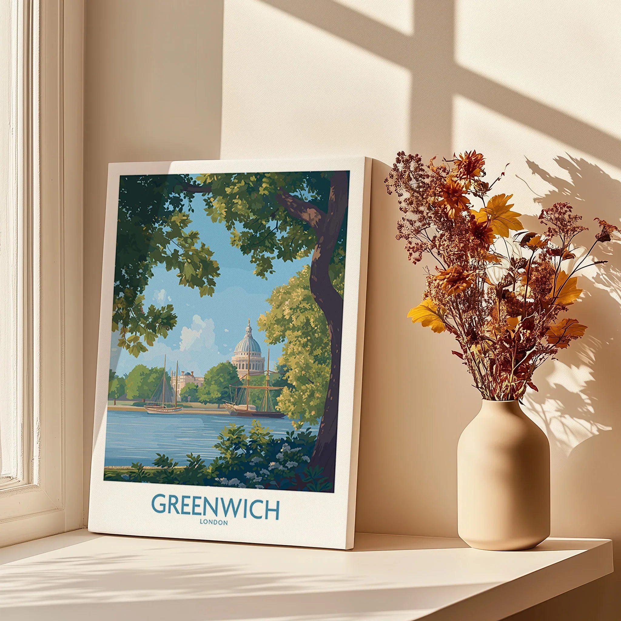 Greenwich London canvas wall art print beside a vase of dried flowers on a sunlit windowsill.