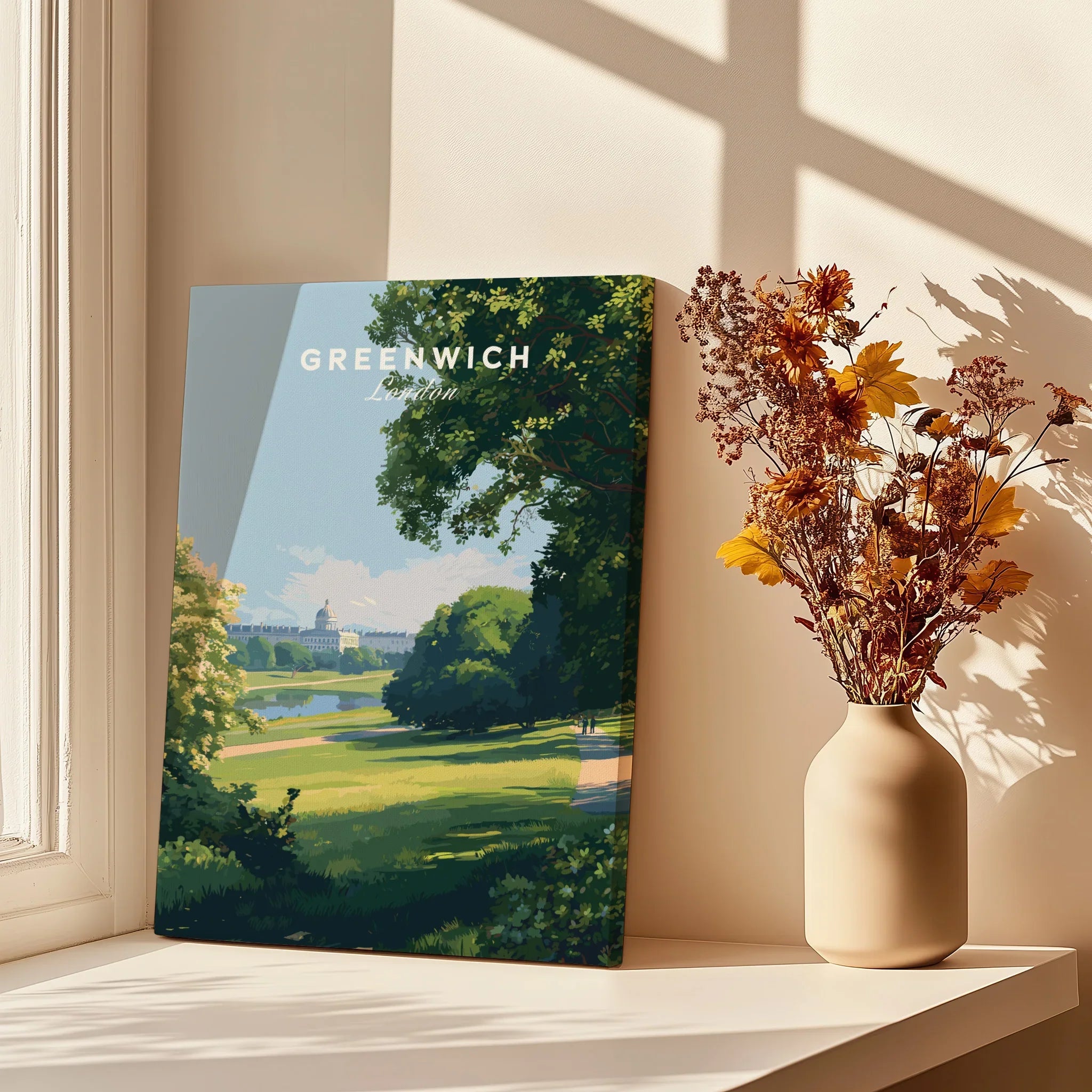Greenwich London travel poster canvas on windowsill with dried flowers in vase, sunlight and shadows