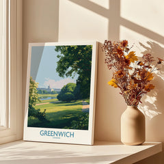 Greenwich London travel poster print by a window with vase of dried flowers and sunlight shadows