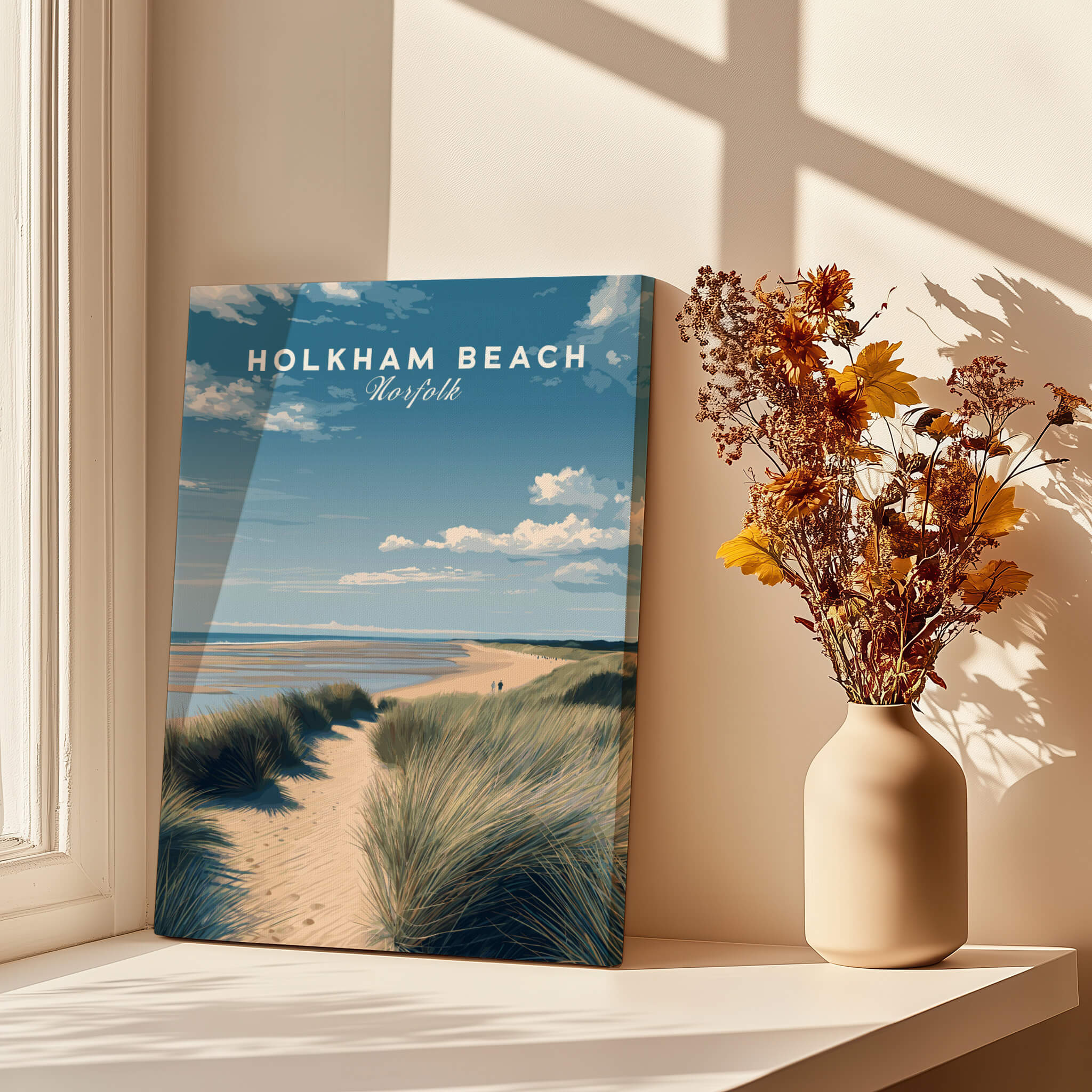 Holkham Beach Norfolk Wall Art Print | Coastal Sand Dunes Travel Poster displayed on a windowsill with flower vase.
