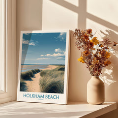 Holkham Beach Norfolk Poster | North Norfolk Shoreline Nature Canvas Print displayed on a windowsill with dried flowers.