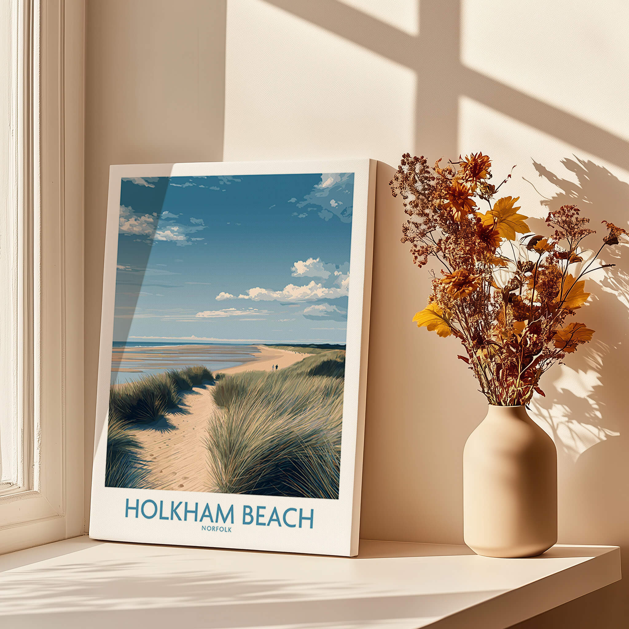 Holkham Beach Norfolk Poster | North Norfolk Shoreline Nature Canvas Print displayed on a windowsill with dried flowers.