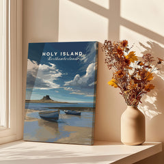 Holy Island Travel Poster Northumberland | Coastal Landscape Wall Art Print displayed near a vase of flowers.