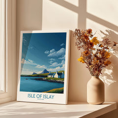 Isle of Islay Scotland Canvas Print | Scottish Hebrides Poster displayed beside a vase of flowers.