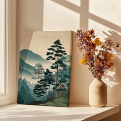 Japanese woodblock wall art with pine trees on a windowsill beside a vase of dried flowers