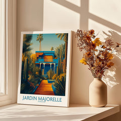 Jardim Majorelle Marrakesh Posters | Vibrant Architecture & Palms Canvas Print displayed next to a vase of flowers.
