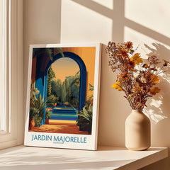 Jardim Majorelle Marrakesh Canvas Print | Exotic Plant & Architecture Posters displayed in a sunlit room with a vase of flowers.