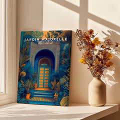 Jardim Majorelle Marrakesh Wall Art Print | Ornate Moroccan Doorway Travel Posters displayed near a vase of flowers.