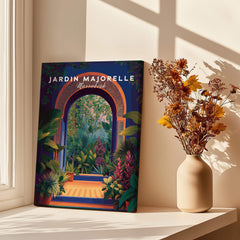 Jardim Majorelle Marrakesh Travel Poster | Lush Tropical Garden Wall Art Print displayed by a sunlit window with flowers.