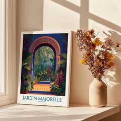 Jardim Majorelle Marrakesh Canvas Print | Colorful Moroccan Landscape Poster displayed in a sunlit room next to a vase of flowers.