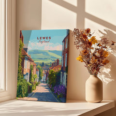 Lewes England travel poster canvas print on window sill with vase of dried flowers