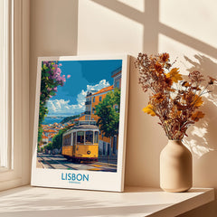 Lisbon Portugal Yellow Tram 28 Art Print | Alfama Hills Wall Decor in a sunlit room with flowers.