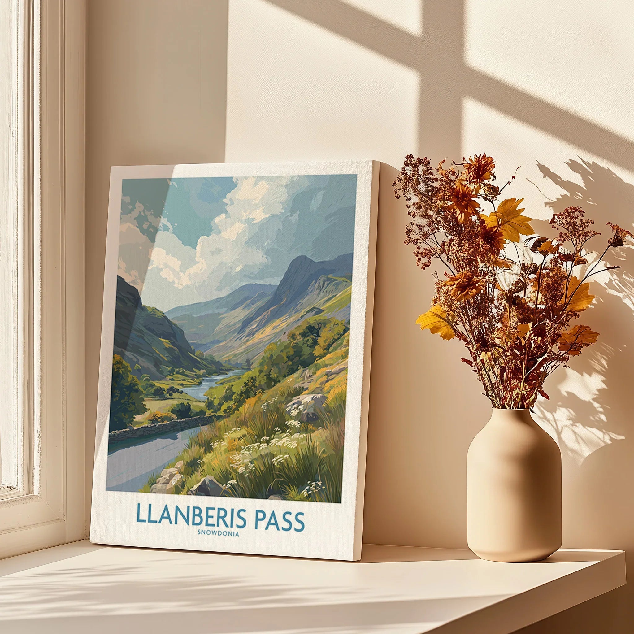Llanberis Pass travel poster canvas print with mountain landscape by a window and vase of dried flowers