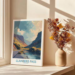 Llanberis Pass Snowdonia travel poster canvas print by window with vase of dried flowers