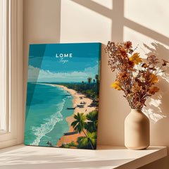Lomé Togo Wall Art Print | Tropical Beach Travel Poster displayed in a sunlit room with a vase of flowers.