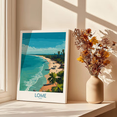 Lomé Togo Poster | West African Coastline Canvas Print showcasing a vibrant beach scene with azure waters and lush vegetation.
