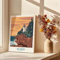 Acadia National Park art print with lighthouse, displayed on sunny windowsill with dried flowers