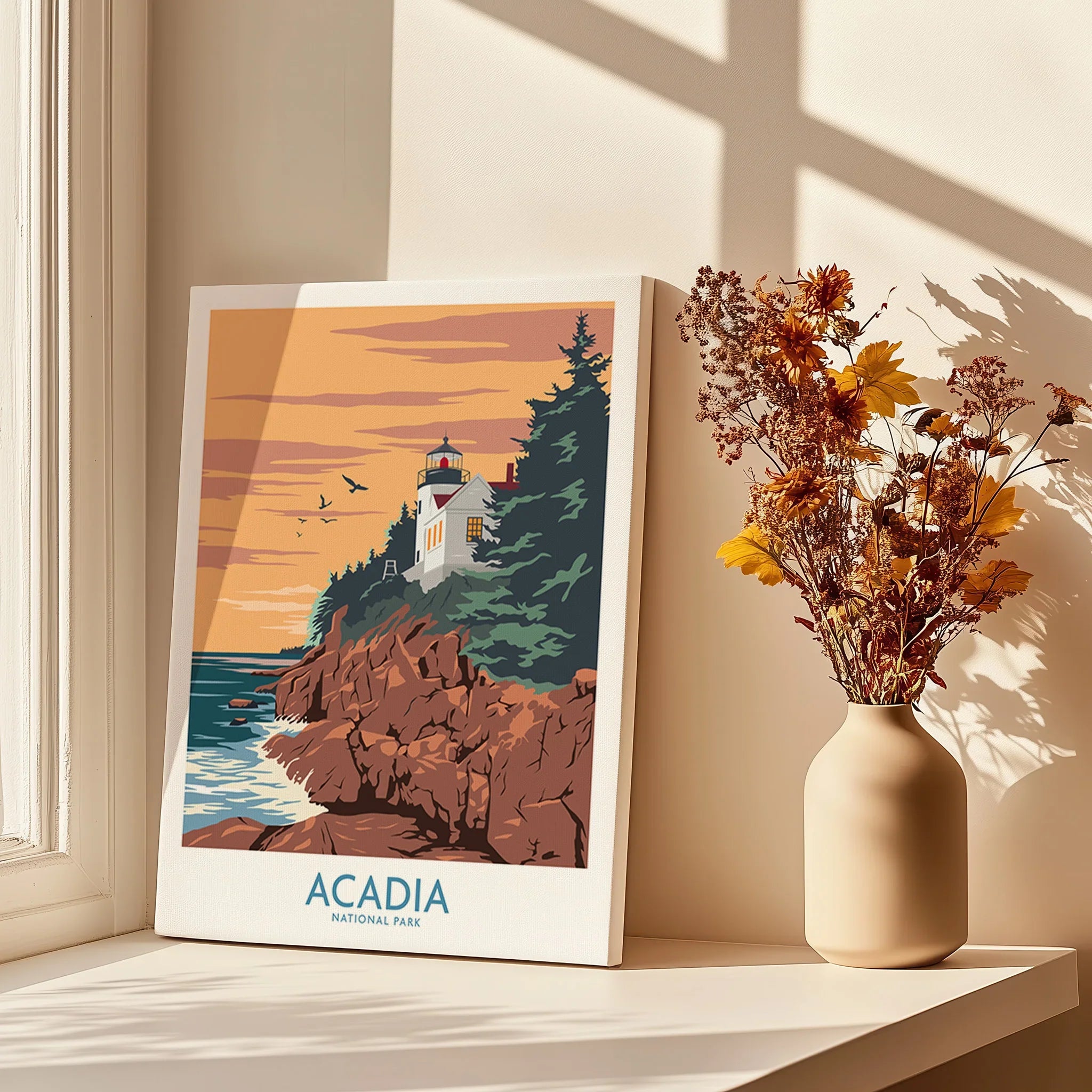 Acadia National Park art print with lighthouse, displayed on sunny windowsill with dried flowers