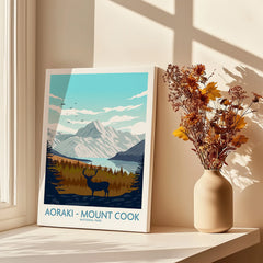 Aoraki Mount Cook National Park print on canvas beside a vase with dried flowers in window light