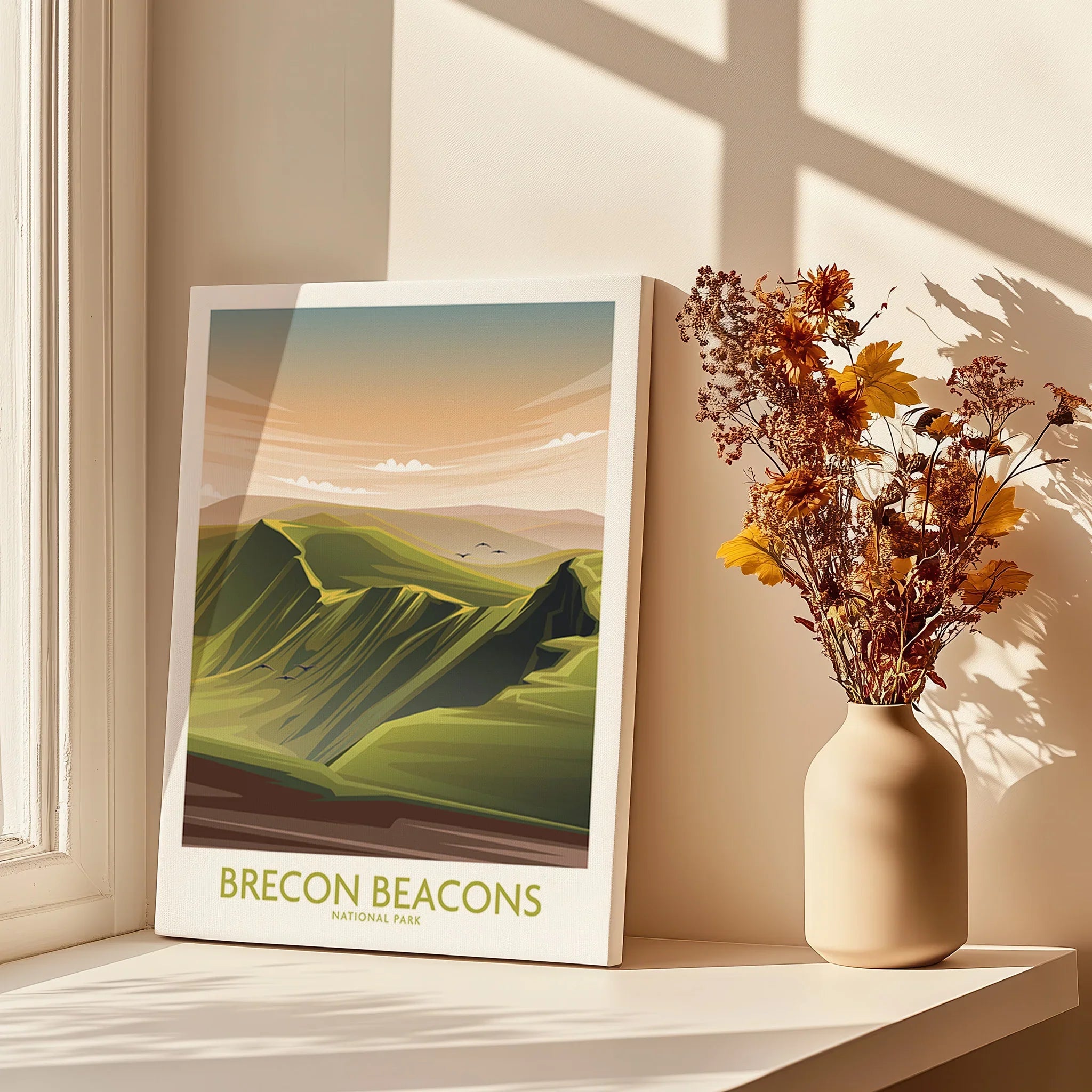 Brecon Beacons National Park canvas print on windowsill with vase of dried flowers in sunlight