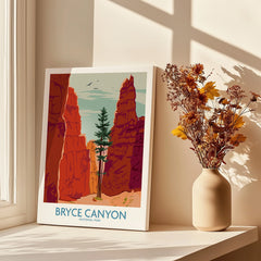 Bryce Canyon National Park art print on windowsill beside vase with dried flowers in sunlight
