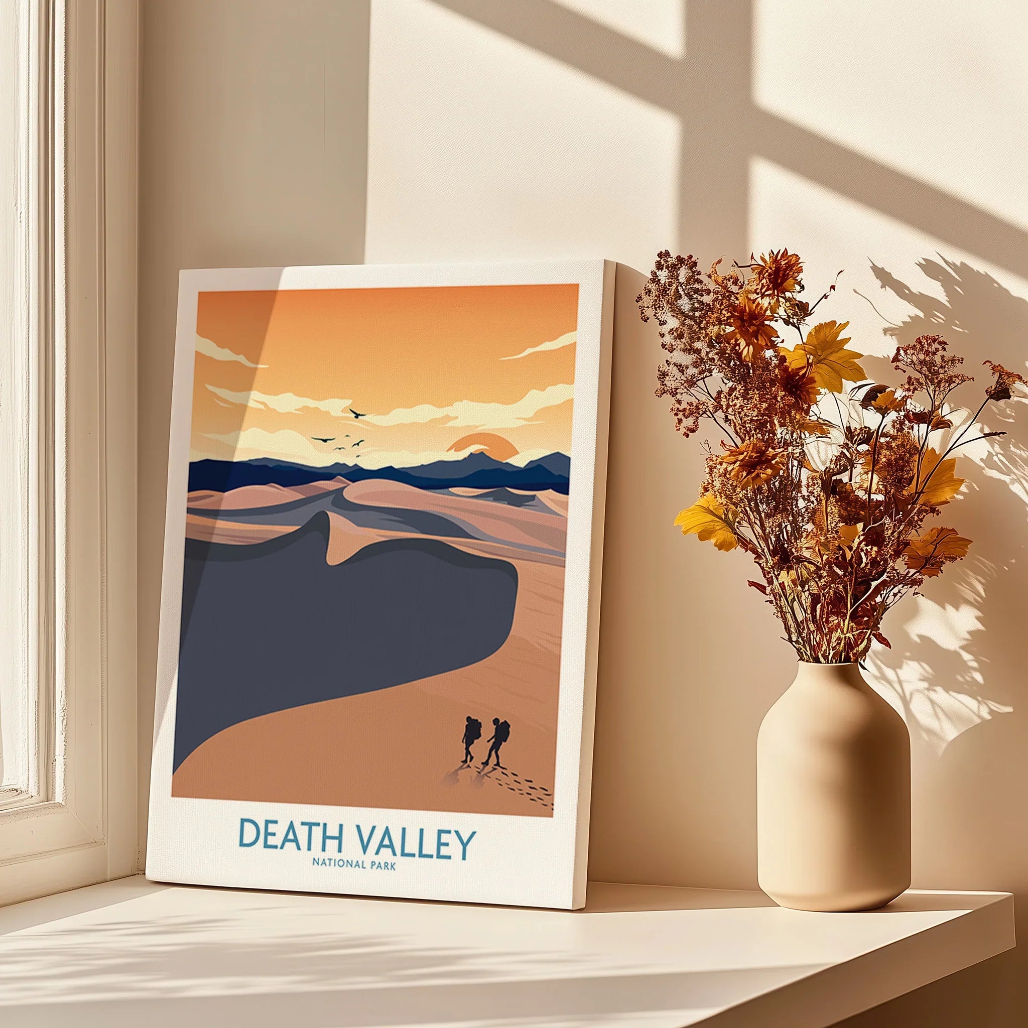 Death Valley National Park canvas print with desert landscape, set by sunlit window and vase of dried flowers