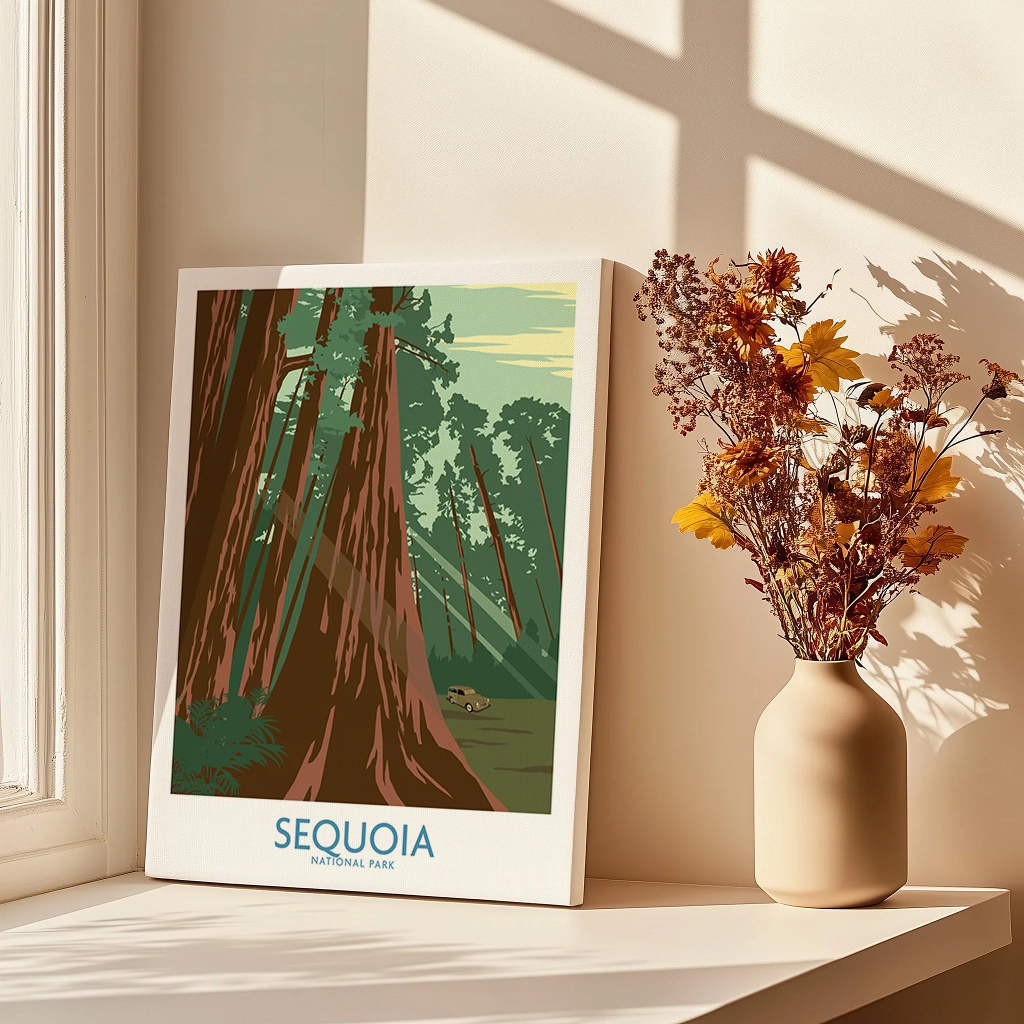 Sequoia National Park art print on canvas beside vase with dried flowers in sunlit window.