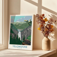 Yellowstone National Park canvas print with waterfall, displayed by a window and vase of dried flowers