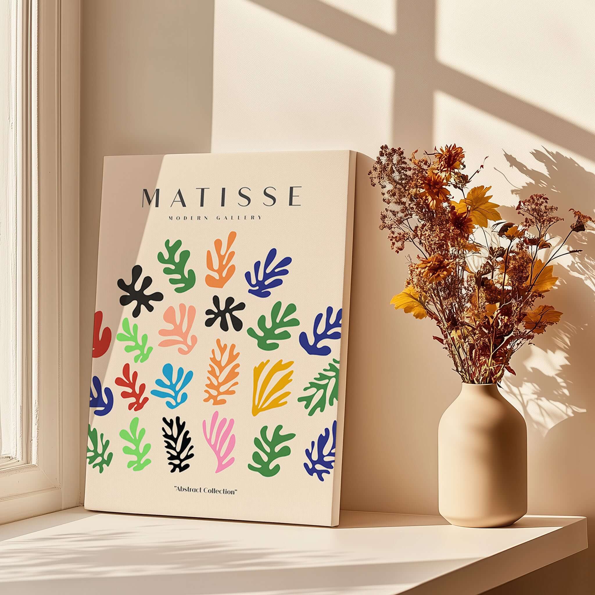 Matisse Art Prints - Colorful Abstract Shapes Scatter Print displayed beside a vase of dried flowers in a bright setting.
