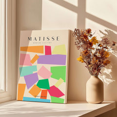 Matisse Art Prints - Colorful Geometric Shapes Abstract Print displayed against a sunny window with flowers.