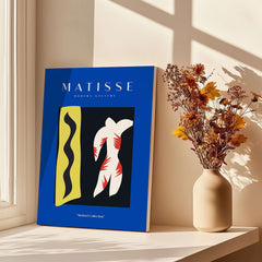 Matisse Art Prints - Icarus Jazz Abstract Art Print Blue displayed in natural light with flowers in a vase.