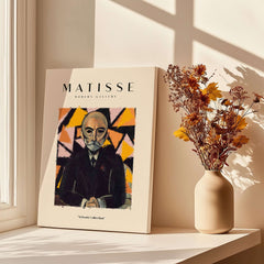 Matisse Art Prints - Portrait Man in Suit Geometric Wall Art on display with warm colors and floral decor.