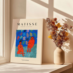 Matisse Art Prints -  Two Figures Flute Poster displayed beside a vase with dried flowers in a sunlit room.