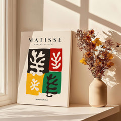 Matisse Art Prints - Four Blocks Abstract Leaves Color Poster displayed in a bright room with flowers.