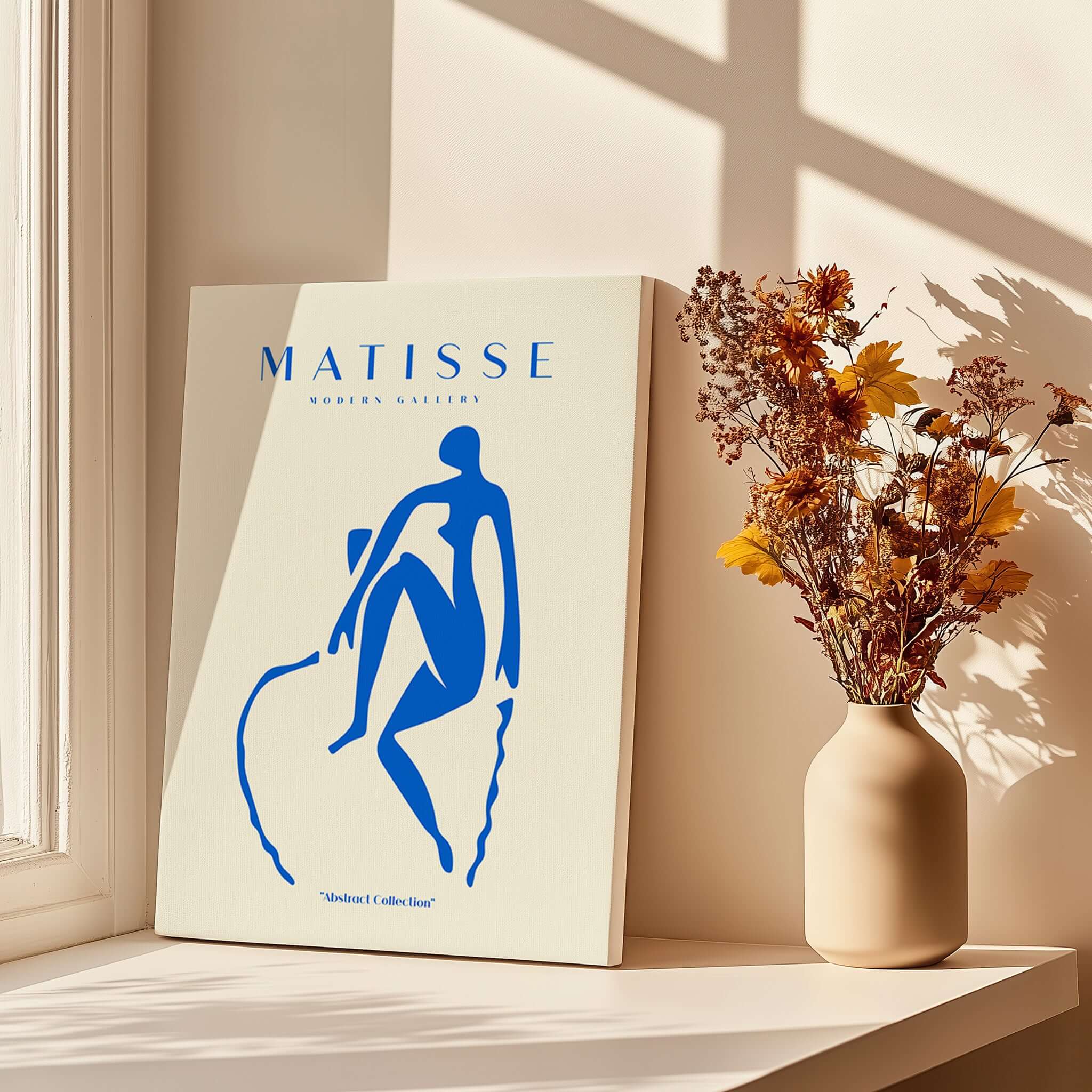 Matisse Art Prints -  Blue Nude Seated Figure Poster displayed with flowers in vase, showcasing minimalist modern art style.