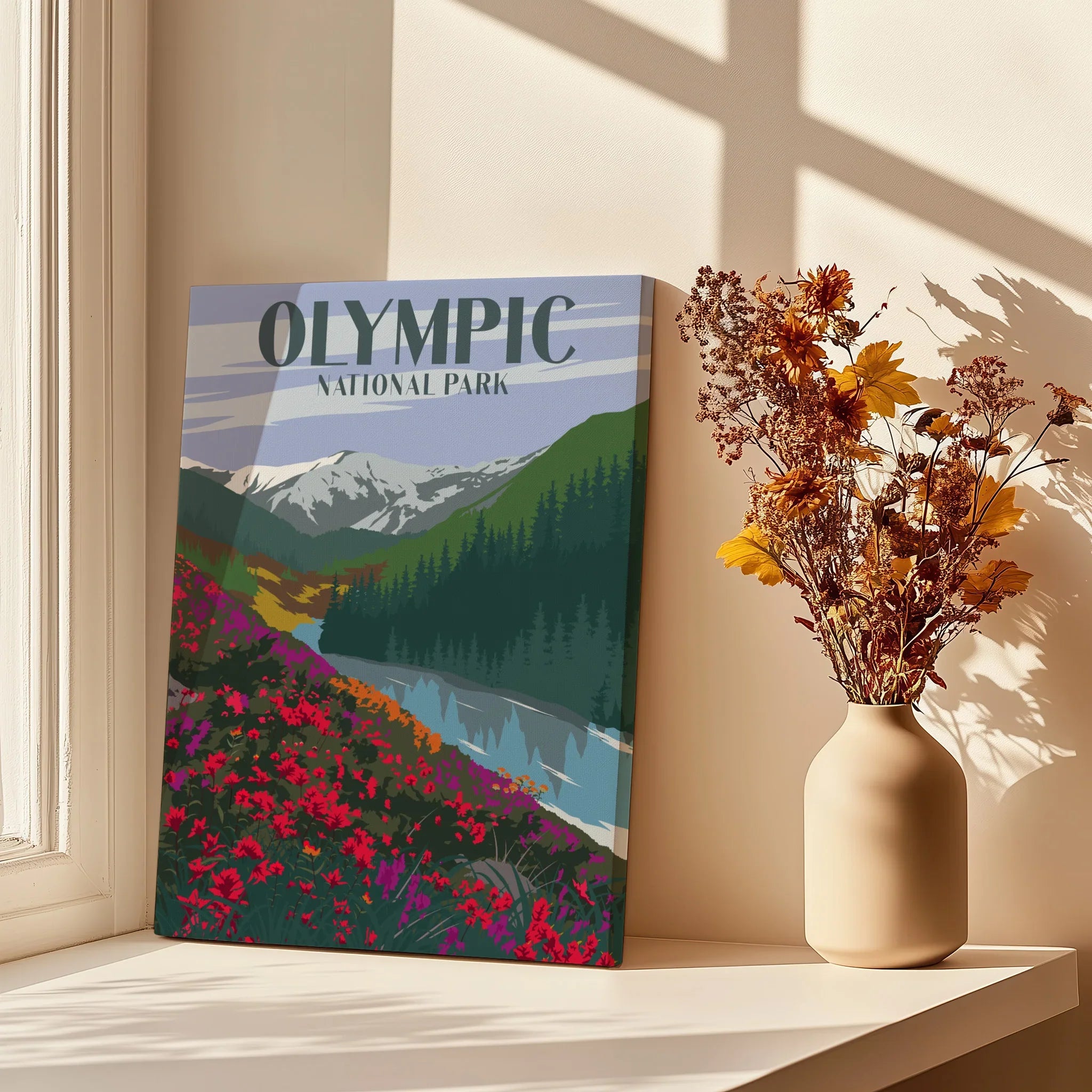 Olympic National Park canvas print with colorful landscape art on a window sill beside dried flowers.