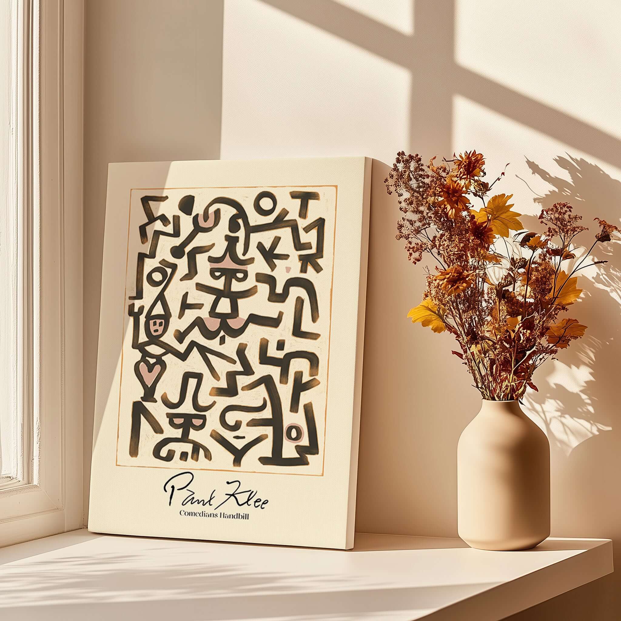 Paul Klee Comedians Handbill Abstract Figures Poster Modern Art Print displayed on a table beside a vase with flowers.