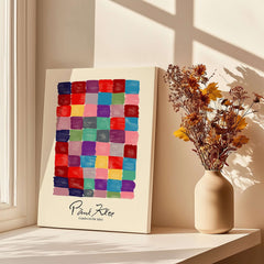 Paul Klee L univers De Klee Colorful Squares Abstract Grid Poster Art Print displayed with flowers in a vase by a window.