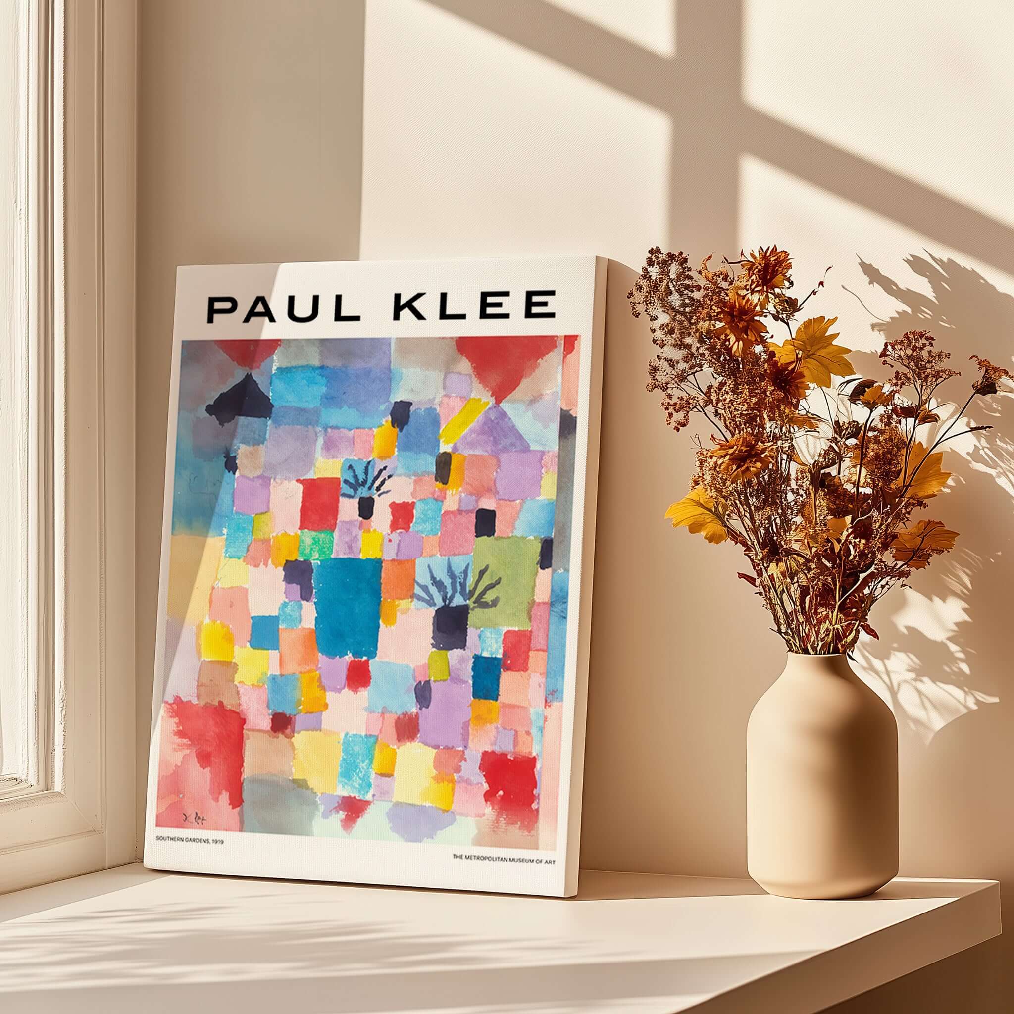 Paul Klee Southern Gardens Abstract Landscape Colorful Poster Art Print showcased next to a vase of dried flowers.