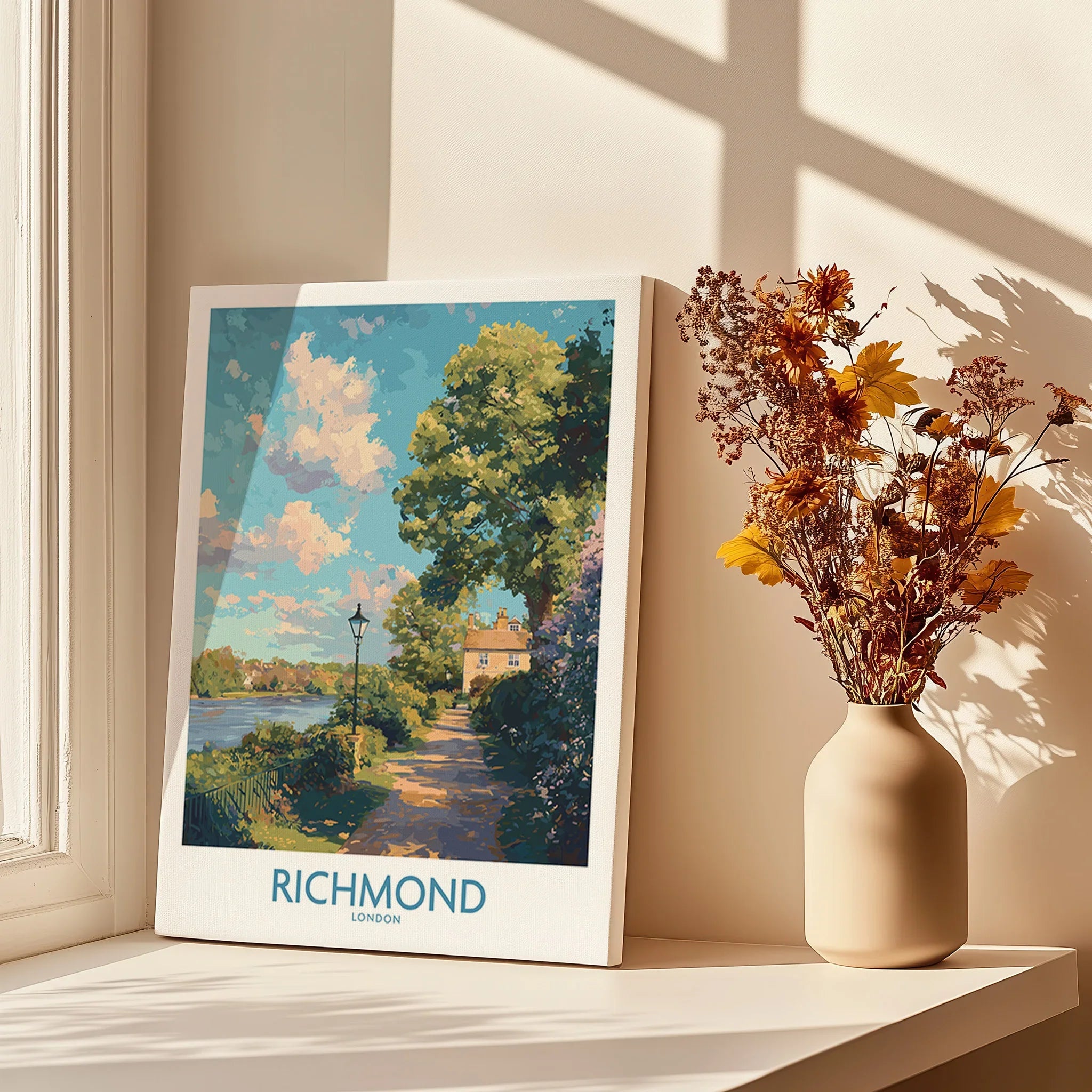 Richmond London travel art print on canvas by a window with vase of dried flowers and shadows