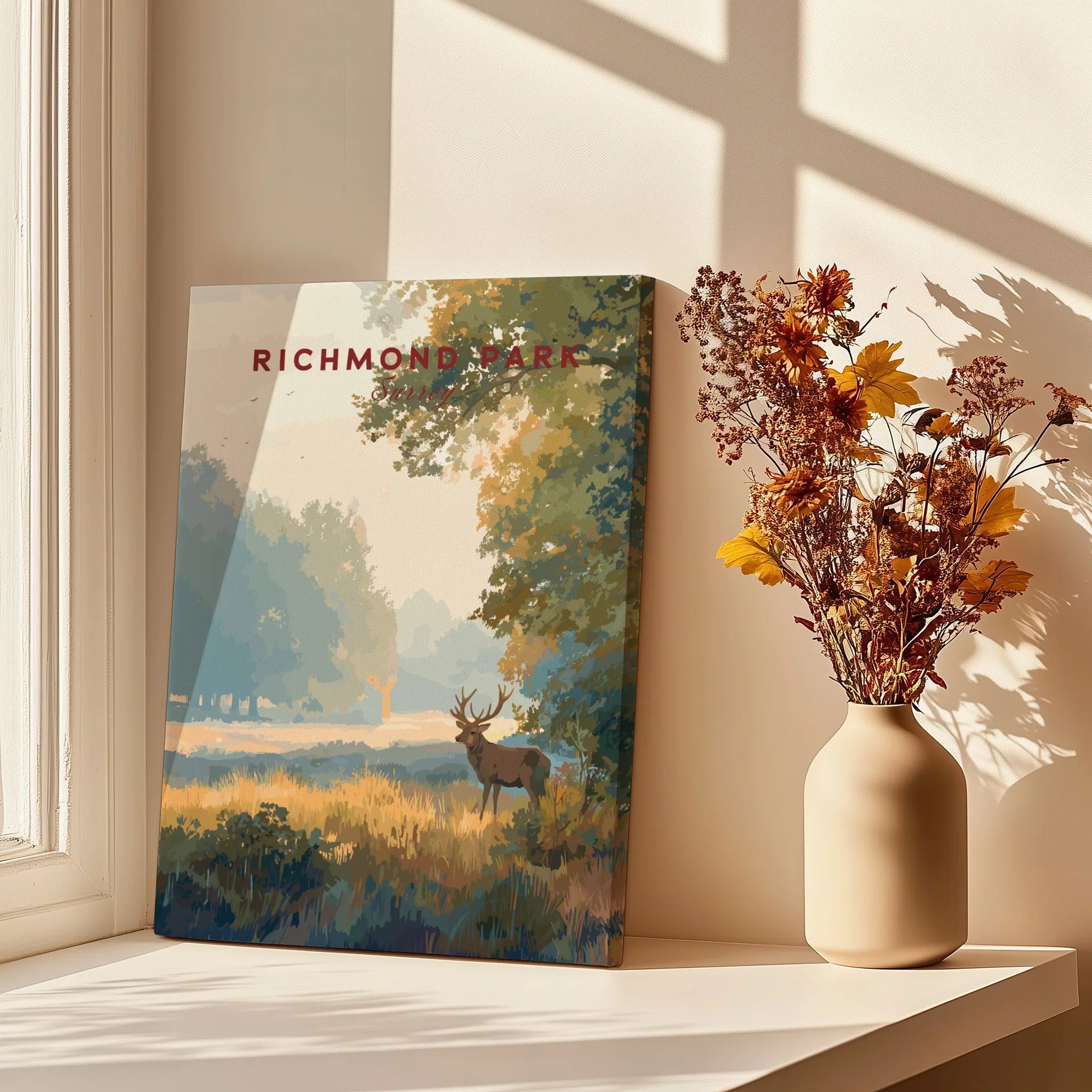 Richmond Park art print on windowsill with sunlight, vase of dried flowers, and nature scene