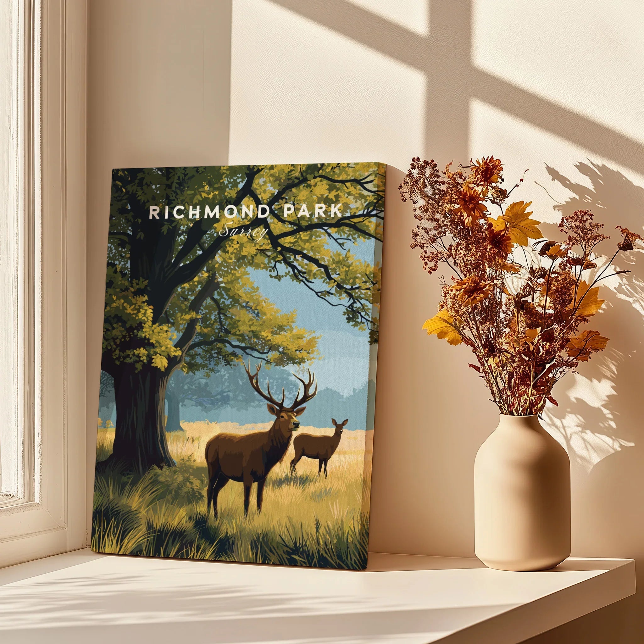 Richmond Park canvas print with deer, displayed by window and vase of dried flowers