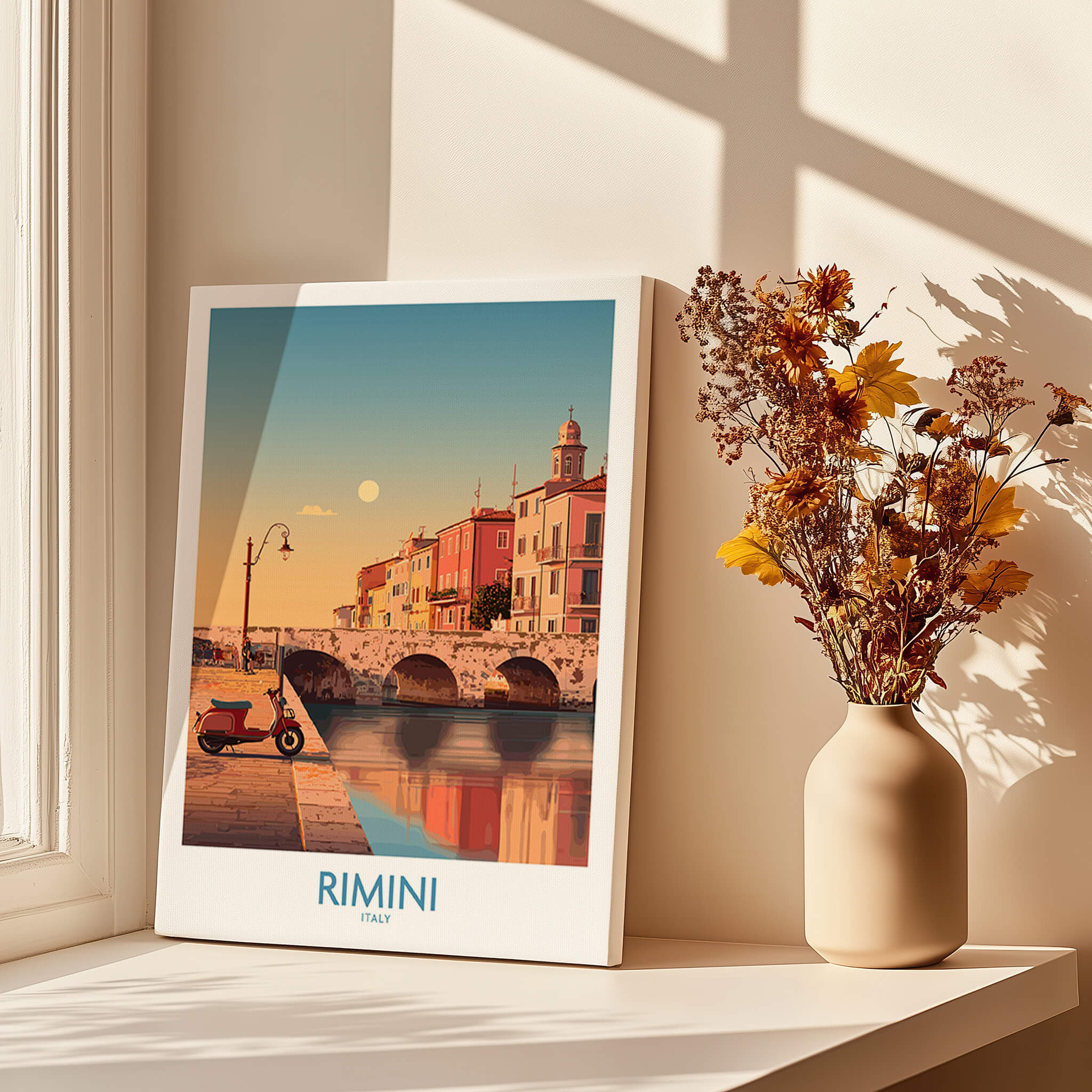 Rimini Italy Poster | Vintage Vespa & Historic Bridge Canvas Print displayed on a table by a window with flowers.