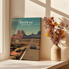Route 66 travel poster canvas print with desert landscape by window, vase of dried flowers nearby