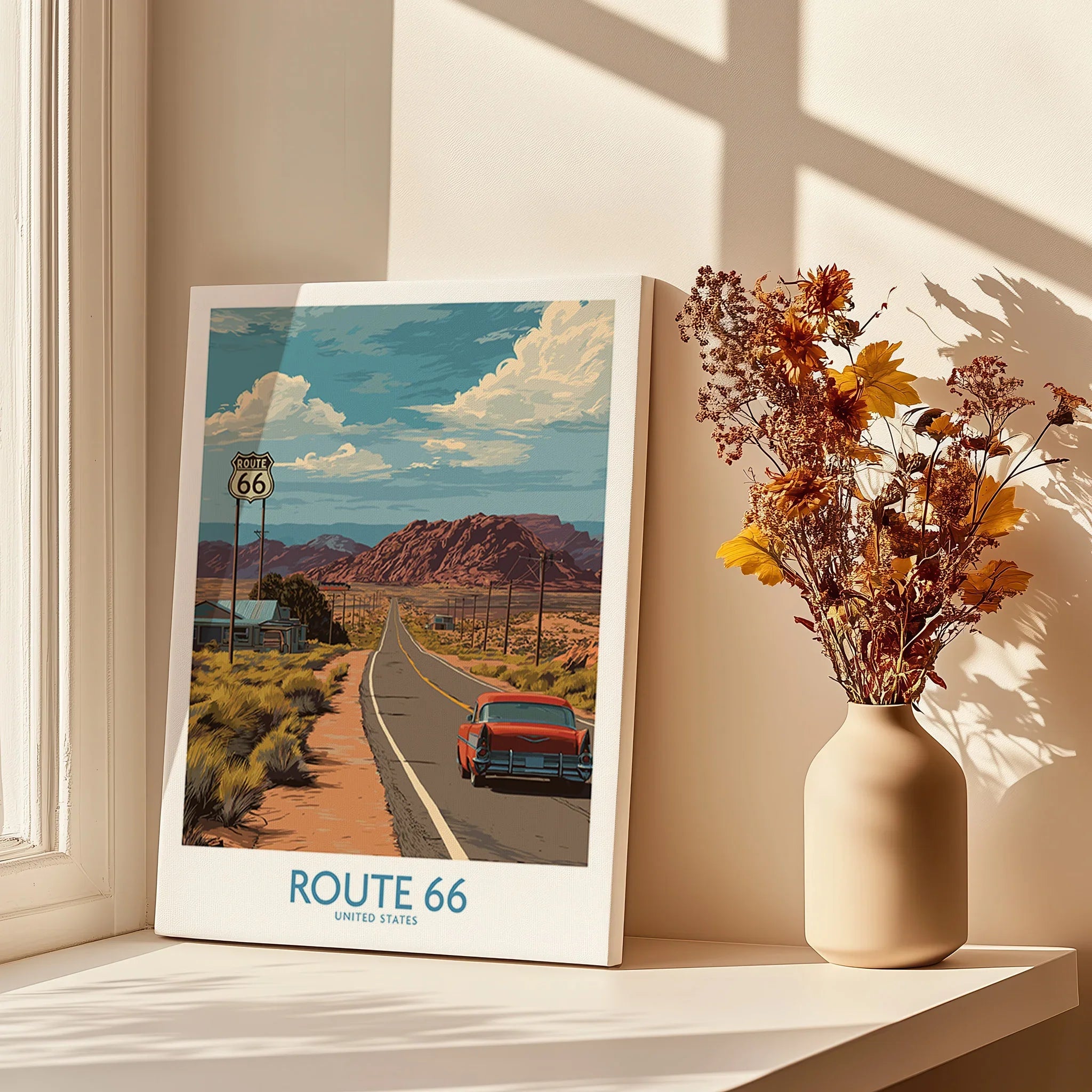 Route 66 wall art print on a windowsill with dried flowers in a vase and natural shadows