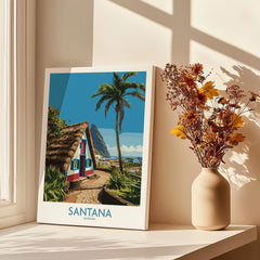 Santana Madeira travel poster print on windowsill with dried flowers in vase, sunlit decor
