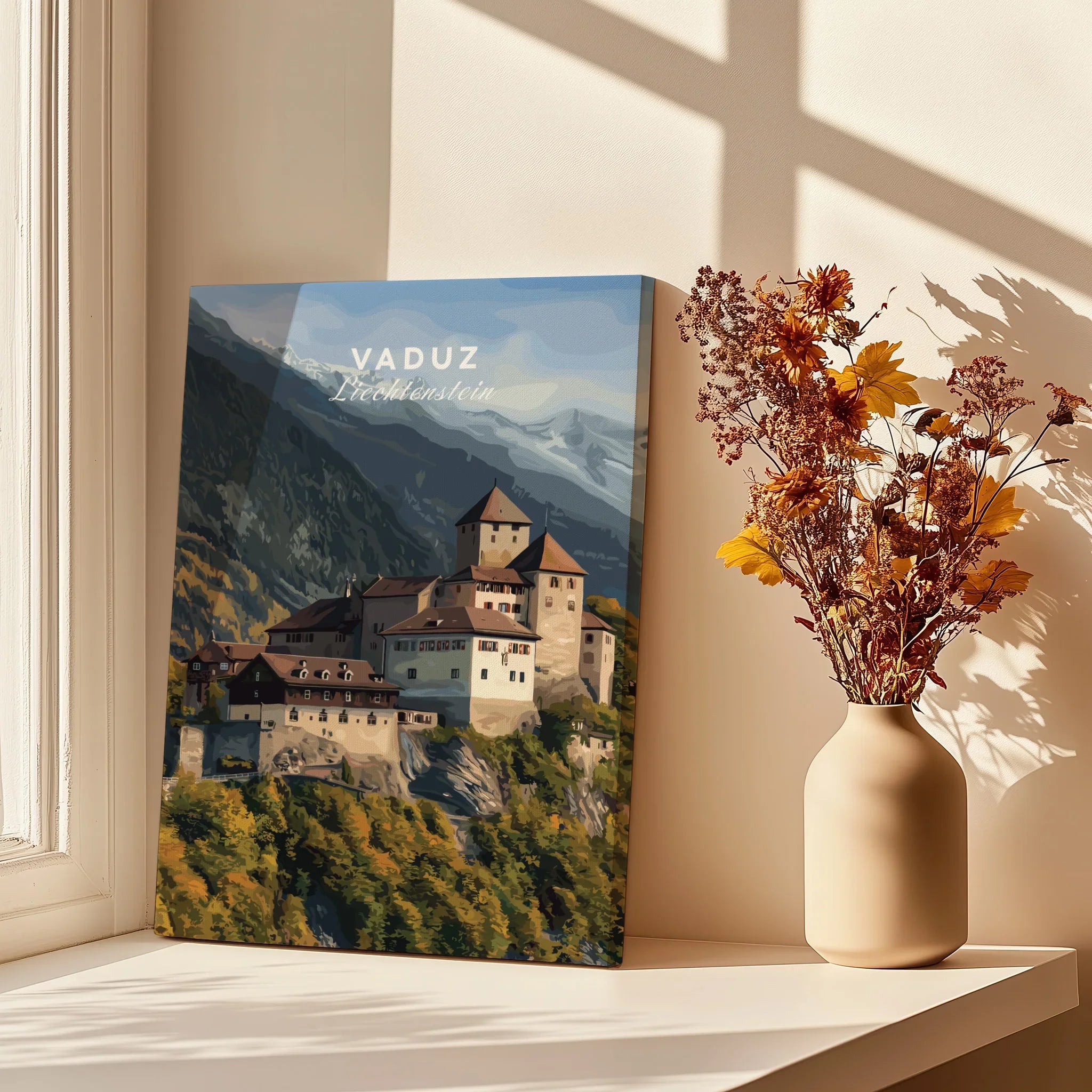 Vaduz Liechtenstein travel poster canvas on windowsill with vase of dried flowers, sunlight