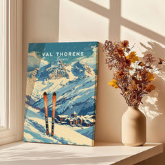 Val Thorens Travel Poster featuring skiing gear against a scenic alpine backdrop in a sunlit room.